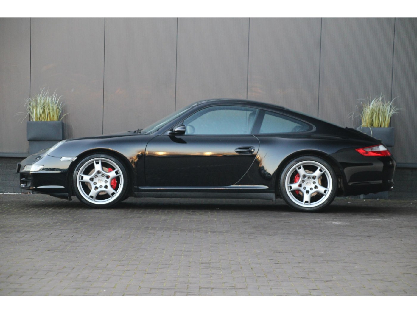 Porsche 911 3.6 Carrera 4 | Brede achterkant | PCCM+ | Youngtimer | — foto 18 van 38